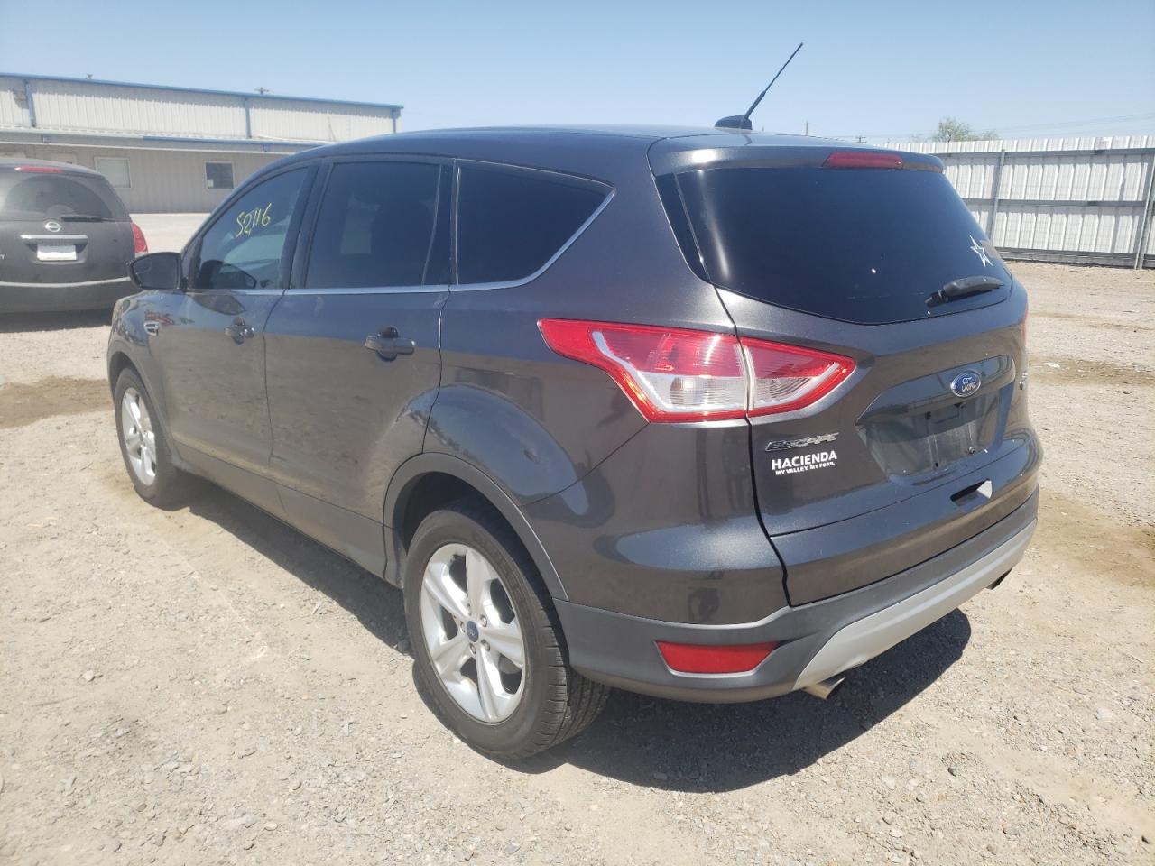Photo 3 from auction – 2016 FORD ESCAPE SE with VIN 1FMCU0GX6GUA28937