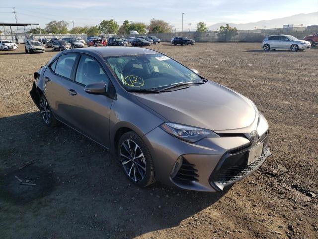 TOYOTA COROLLA L 2018 with VIN 5YFBURHE9JP791735 - Photo from auction
