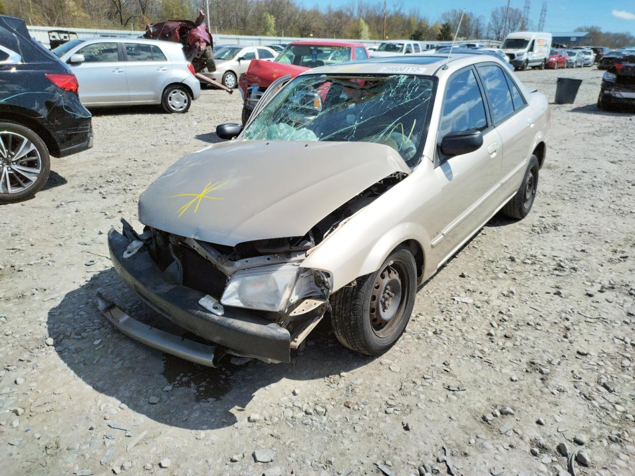 Photo 2 from auction – 1999 MAZDA PROTEGE DX with VIN JM1BJ2225X0183325