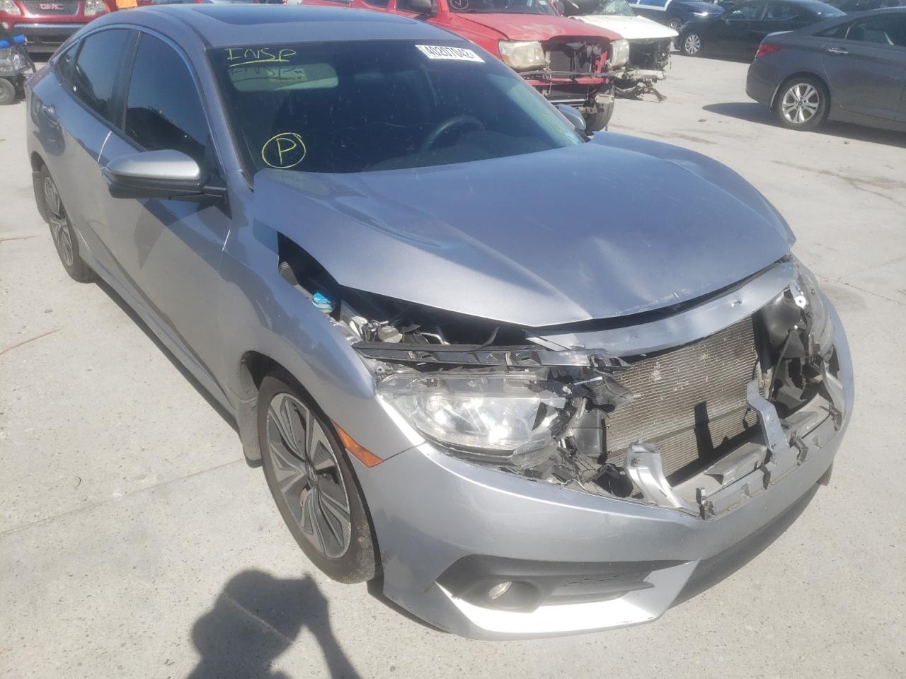 HONDA CIVIC EX 2016 with VIN 19XFC1F30GE009467 - Photo from auction