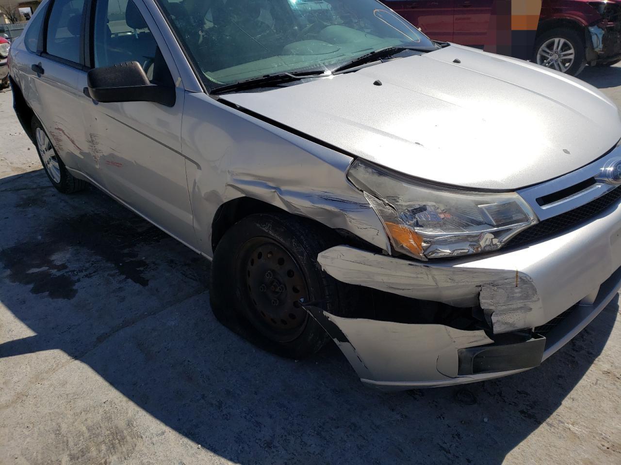 Photo 9 from auction – 2009 FORD FOCUS S with VIN 1FAHP34N79W130024