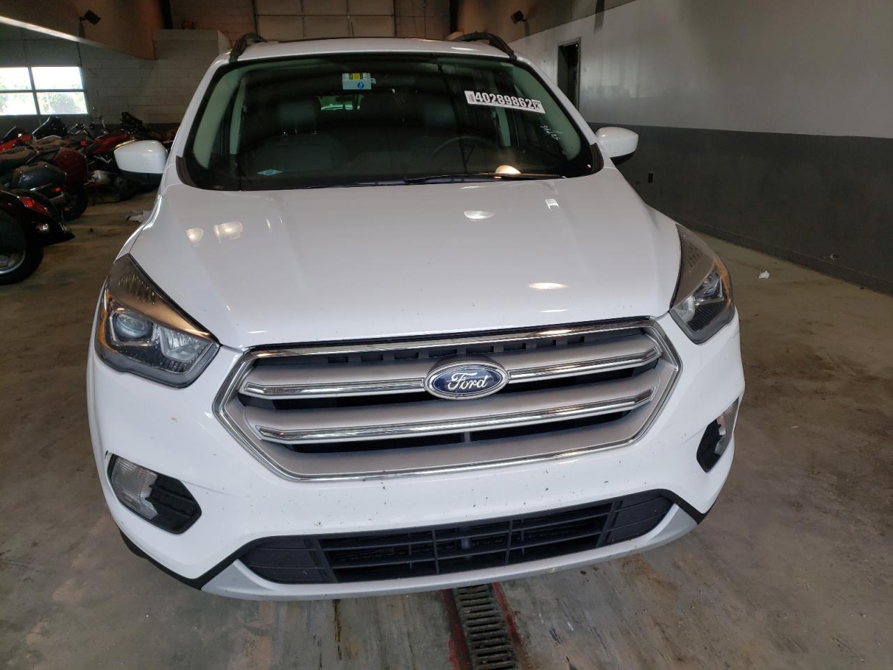 Photo 9 from auction – 2018 FORD ESCAPE SEL with VIN 1FMCU9HD2JUB81797