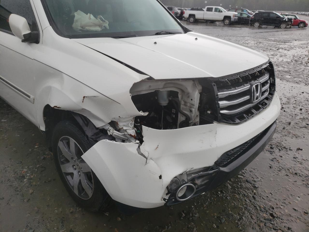 Photo 9 from auction – 2012 HONDA PILOT TOUR with VIN 5FNYF3H92CB042049