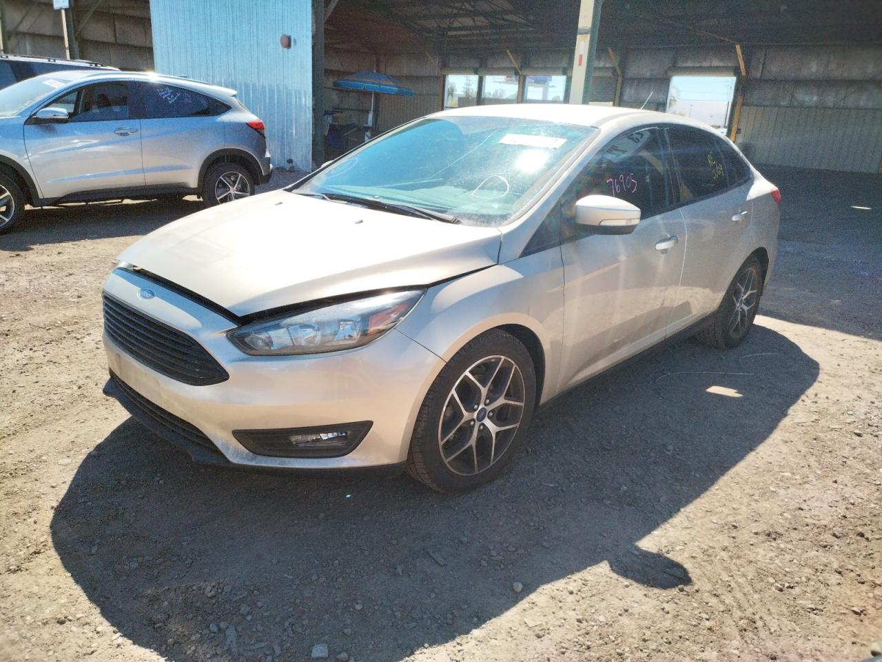 Photo 2 from auction – 2017 FORD FOCUS SE with VIN 1FADP3FE3HL262452
