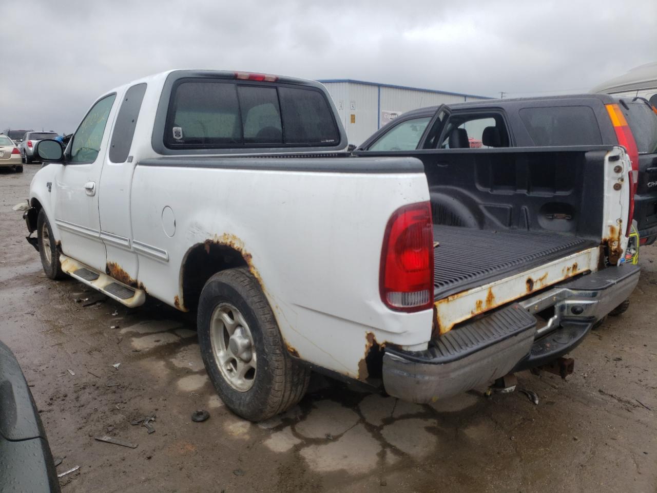 Photo 3 from auction – 1998 FORD F150 with VIN 1FTRX17L6WNB26934