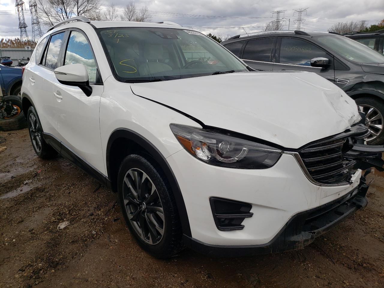 MAZDA CX-5 GT 2016 with VIN JM3KE4DY4G0868005 - Photo from auction