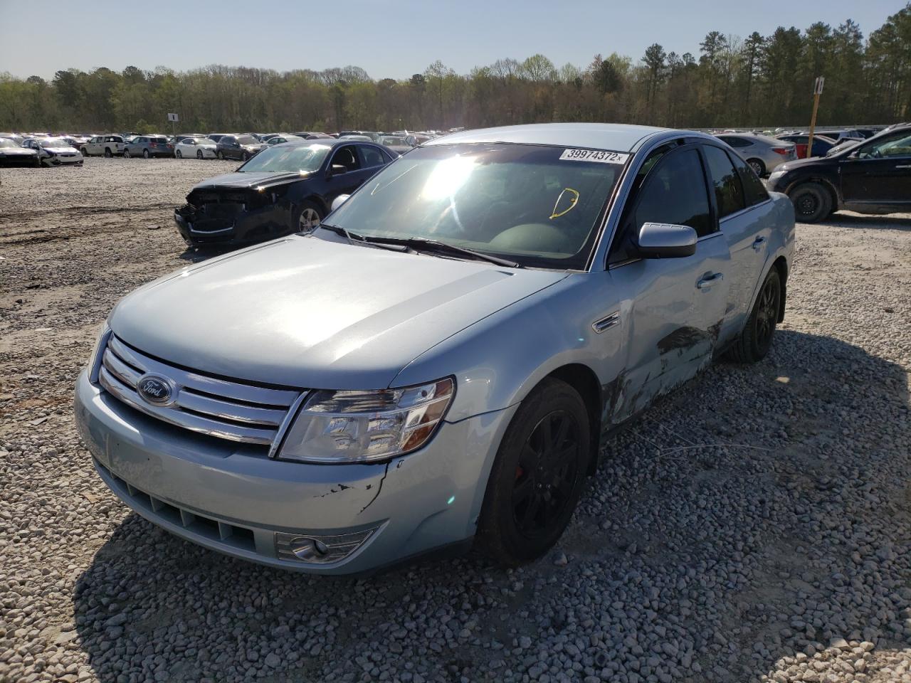 Photo 2 from auction – 2009 FORD TAURUS with VIN 1FAHP23WX9G120022