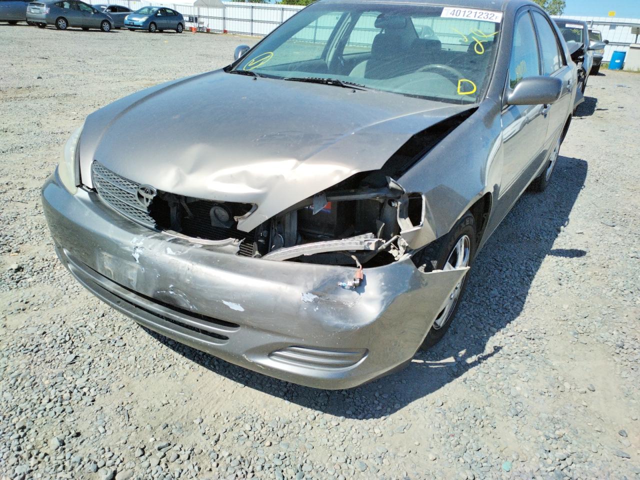 Photo 9 from auction – 2003 TOYOTA CAMRY LE with VIN 4T1BE32K73U702982