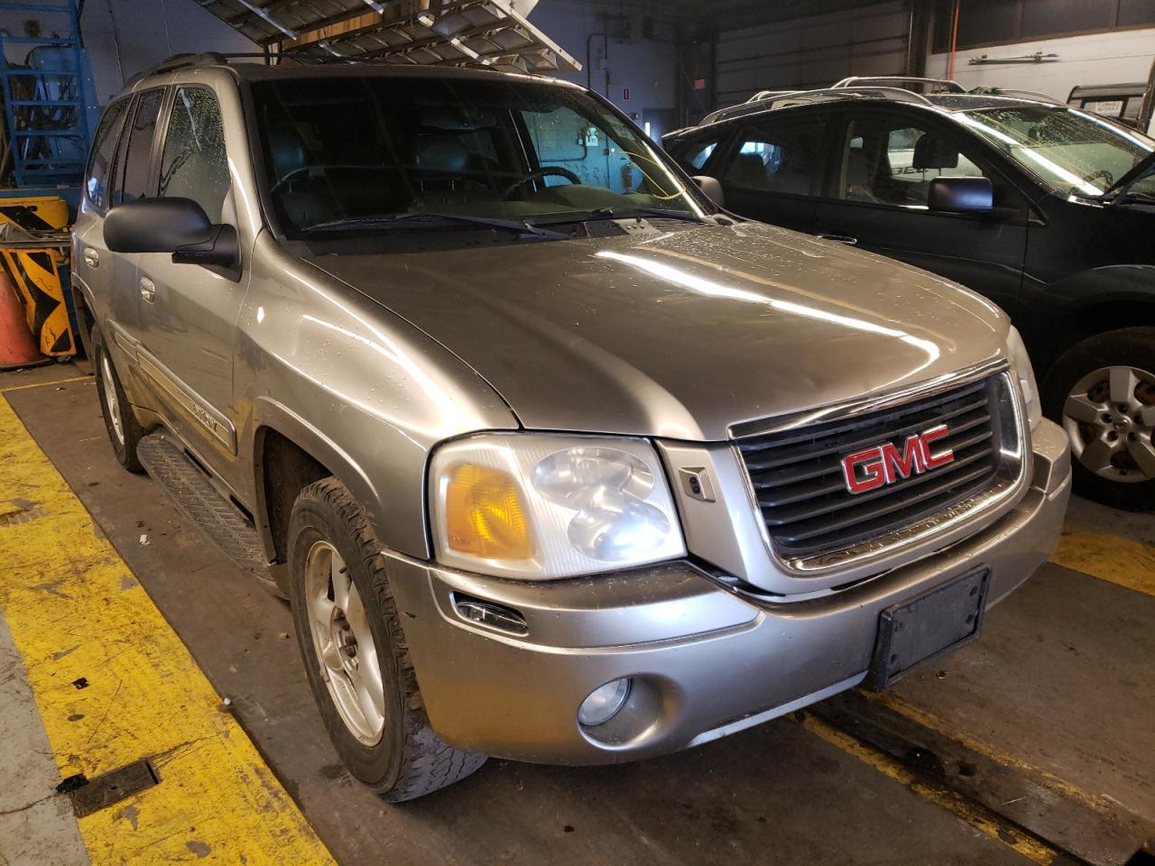 GMC ENVOY 2002 with VIN 1GKDT13S722509302 - Photo from auction