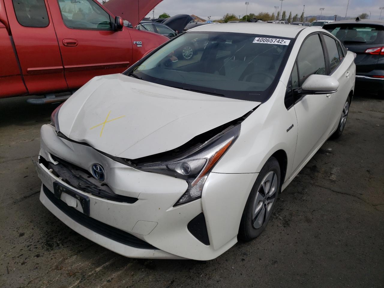 Photo 2 from auction – 2016 TOYOTA PRIUS with VIN JTDKARFU4G3003707