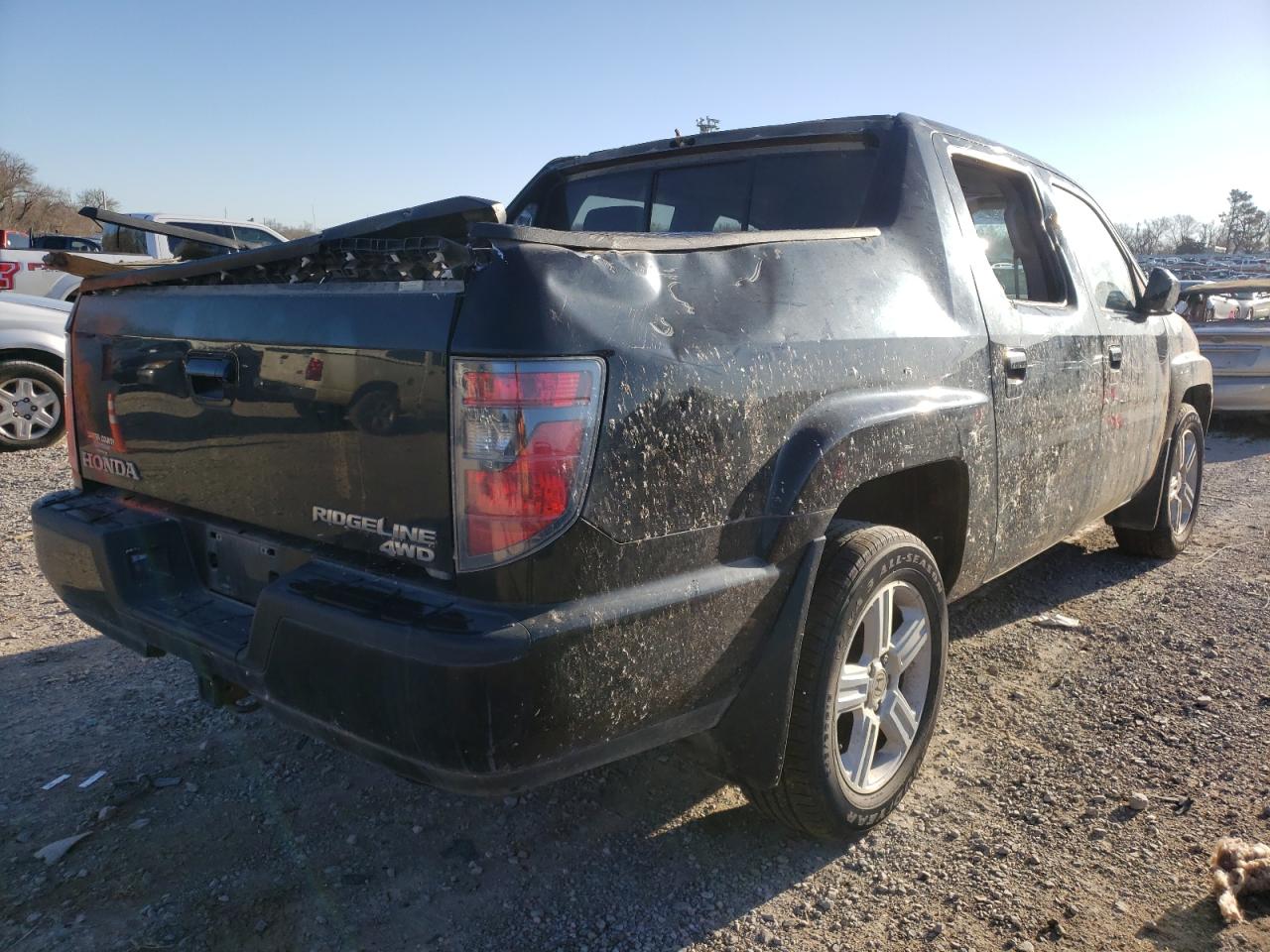 Photo 4 from auction – 2013 HONDA RIDGELINE with VIN 5FPYK1F53DB013278
