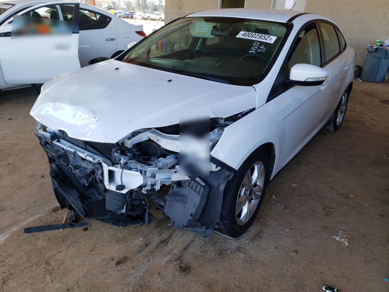 Photo 2 from auction – 2013 FORD FOCUS SE with VIN 1FADP3F25DL290804