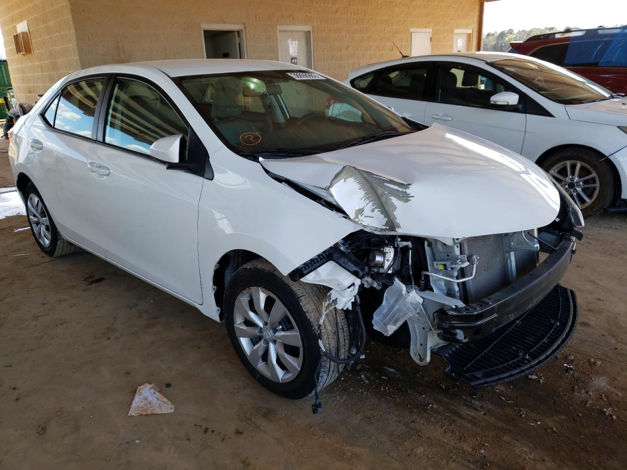 TOYOTA COROLLA L 2016 with VIN 5YFBURHE1GP517521 - Photo from auction