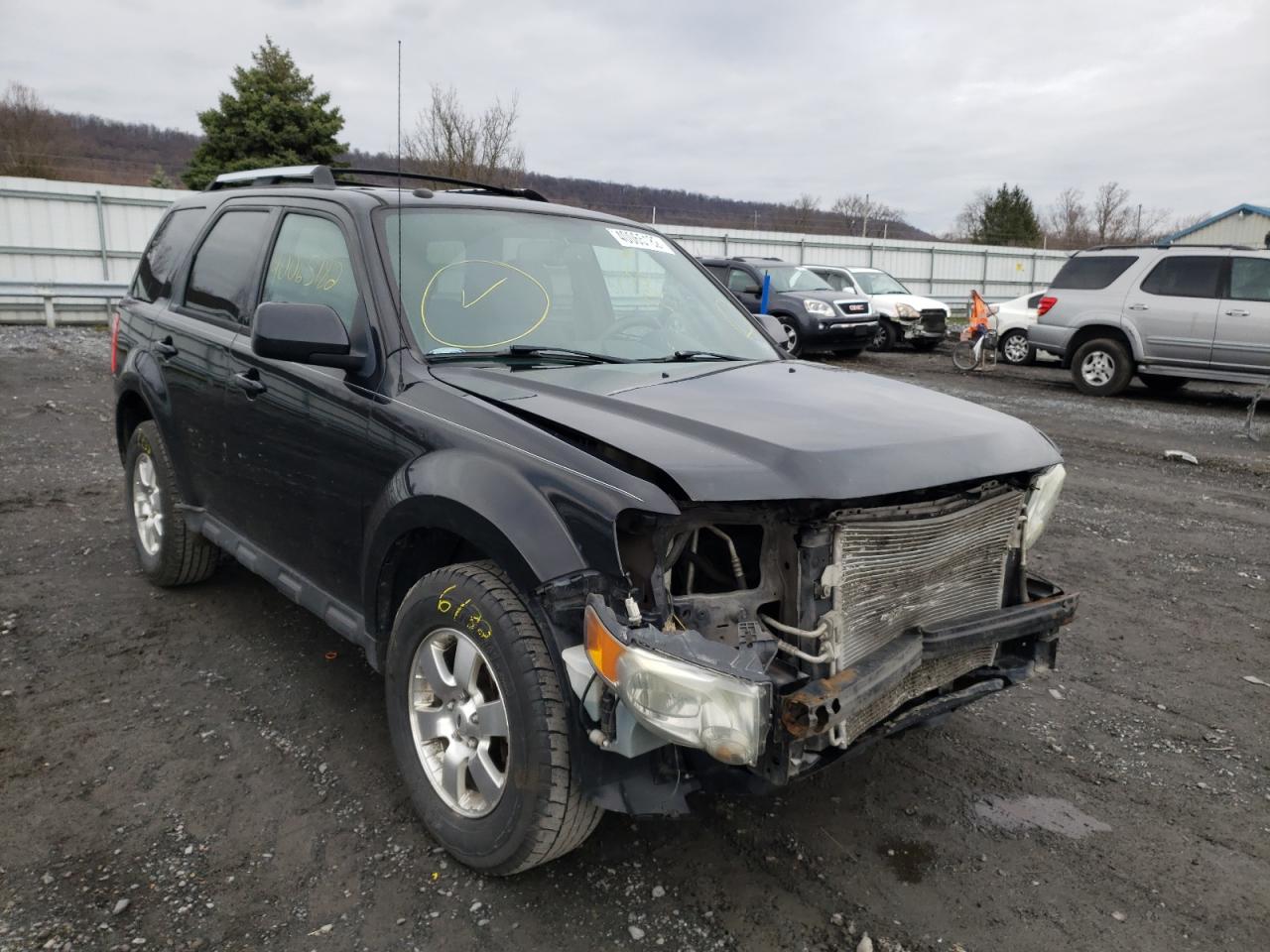 FORD ESCAPE LIM 2011 with VIN 1FMCU9EG3BKB79018 - Photo from auction