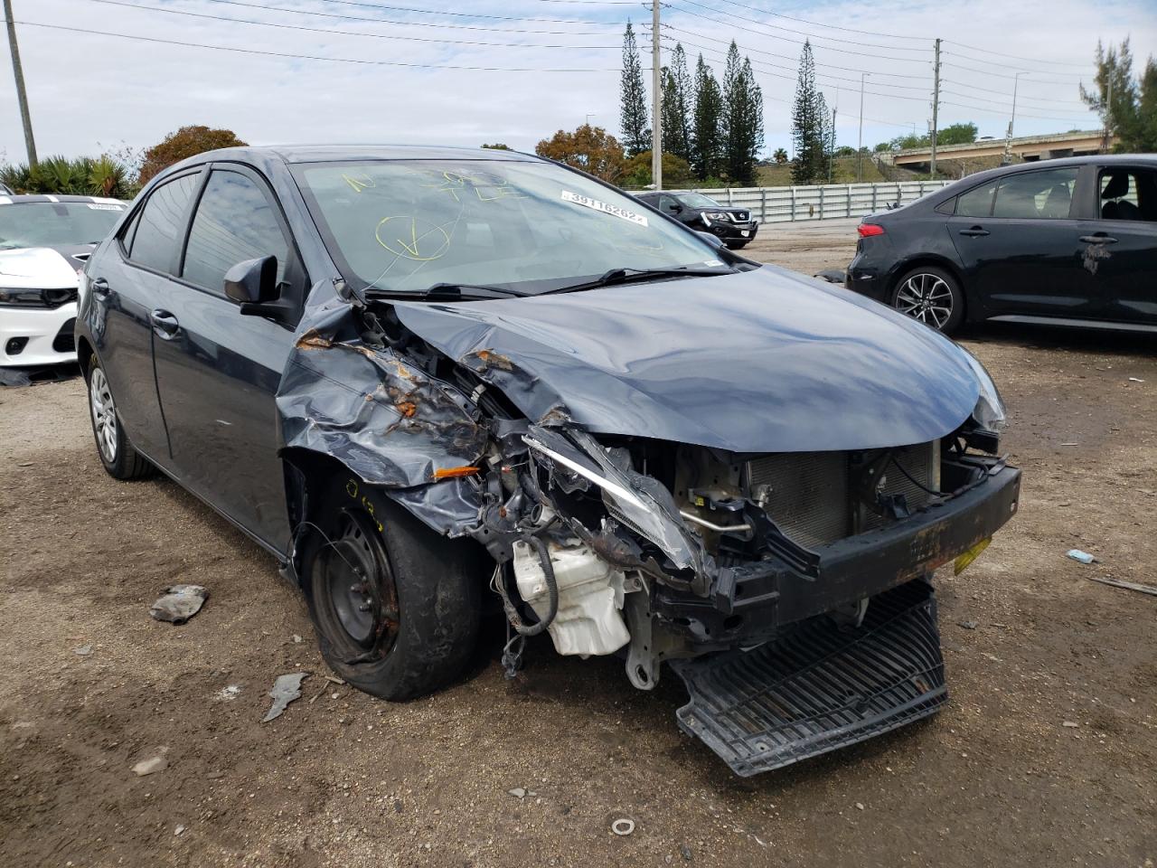 TOYOTA COROLLA L 2017 with VIN 5YFBURHE2HP691745 - Photo from auction
