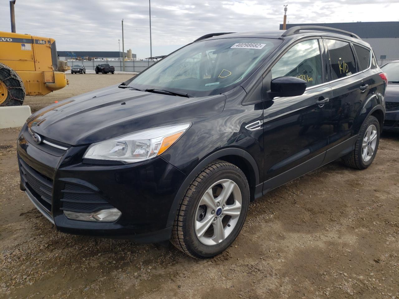 Photo 2 from auction – 2016 FORD ESCAPE SE with VIN 1FMCU9G9XGUC31397