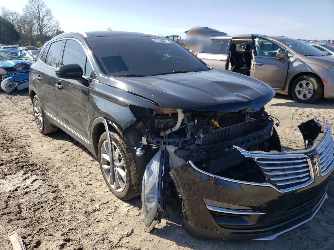 LINCOLN MKC 2015 with VIN 5LMCJ1A97FUJ07618 - Photo from auction