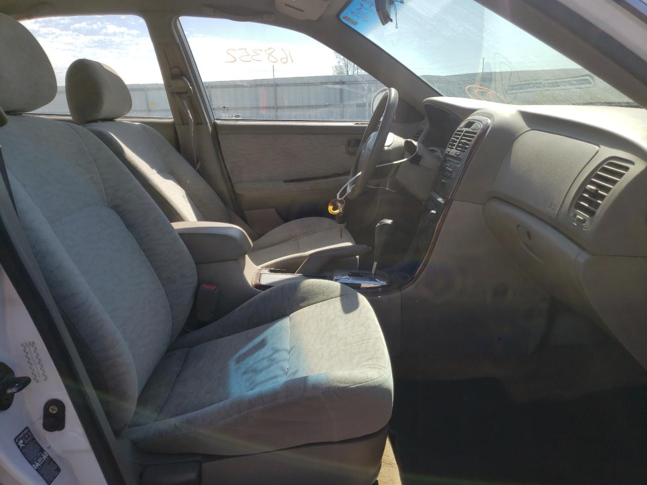 Photo 5 from auction – 2005 KIA OPTIMA LX with VIN KNAGD128155390013