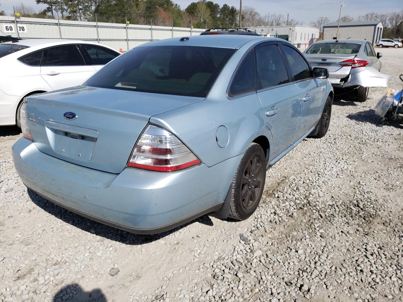 Photo 4 from auction – 2009 FORD TAURUS with VIN 1FAHP23WX9G120022