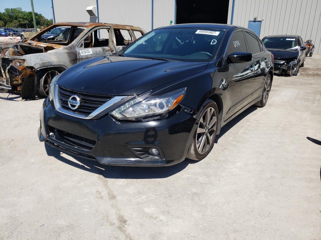 Photo 2 from auction – 2017 NISSAN ALTIMA 2.5 with VIN 1N4AL3AP3HC142576