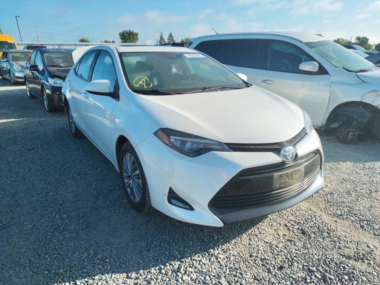 TOYOTA COROLLA LE 2017 with VIN 5YFBPRHE2HP580622 - Photo from auction
