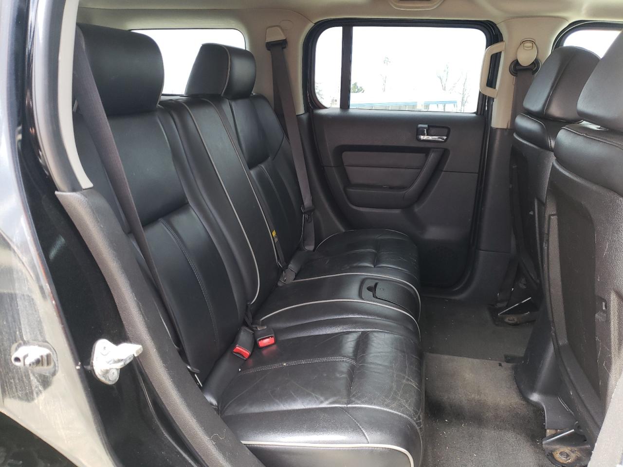 Photo 6 from auction – 2006 HUMMER H3 with VIN 5GTDN136668271690