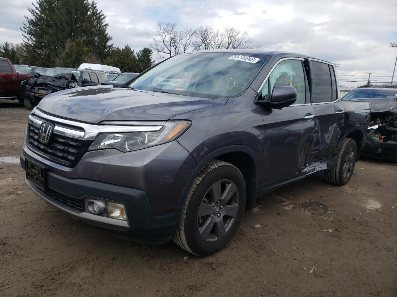 Photo 2 from auction – 2020 HONDA RIDGELINE with VIN 5FPYK3F74LB012927