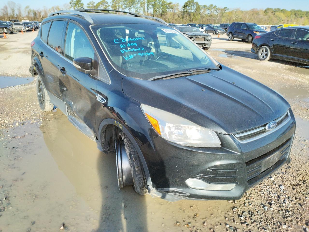 FORD ESCAPE TIT 2014 with VIN 1FMCU9JX0EUA65489 - Photo from auction