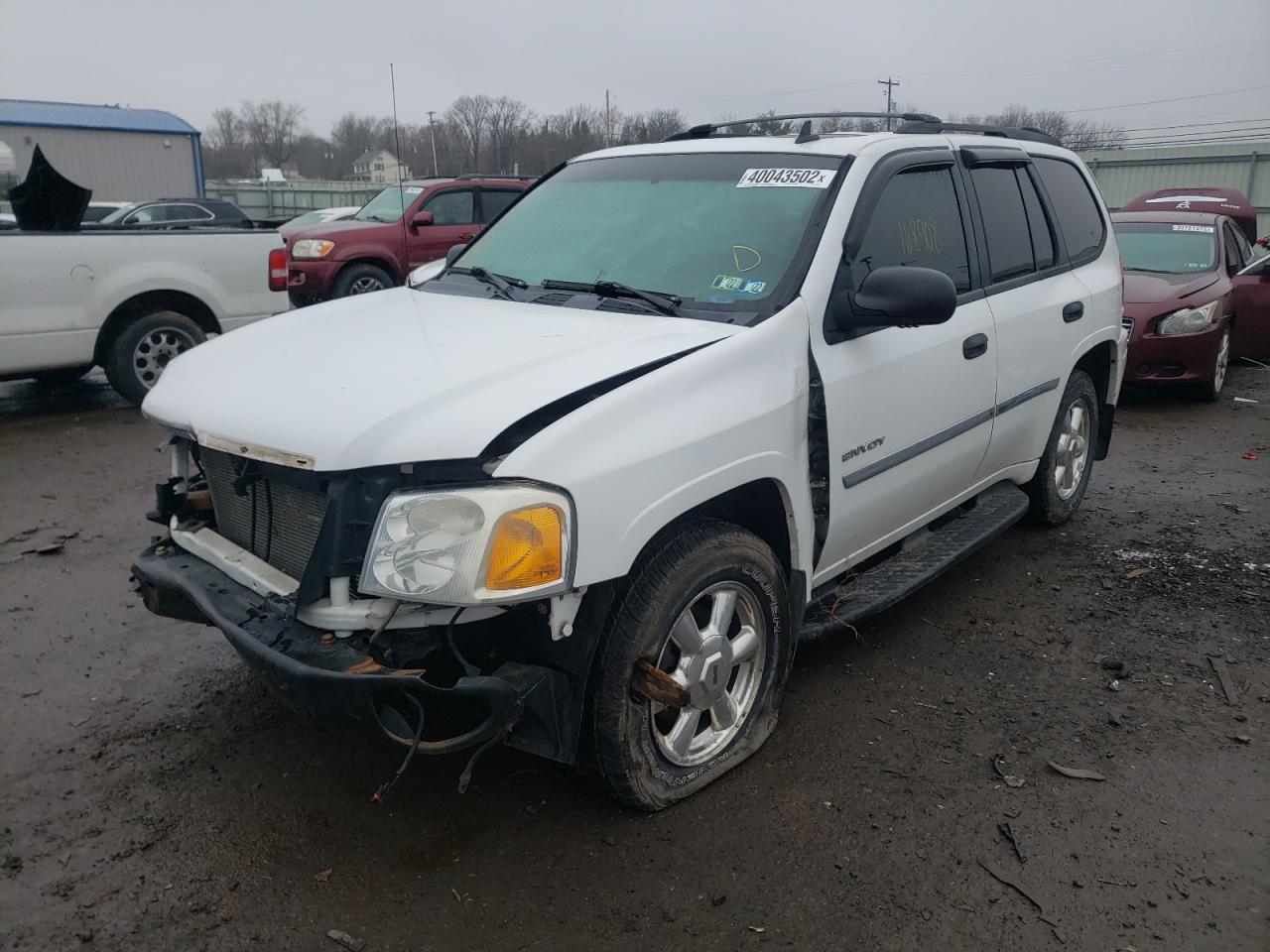 Photo 2 from auction – 2006 GMC ENVOY with VIN 1GKDT13S062156729