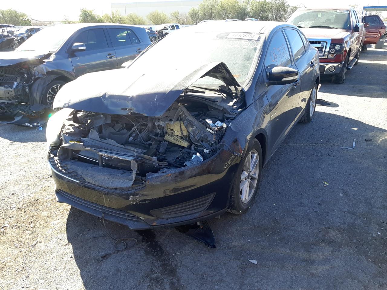 Photo 2 from auction – 2016 FORD FOCUS SE with VIN 1FADP3F23GL268336