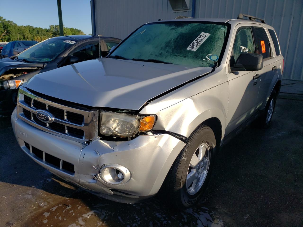Photo 2 from auction – 2011 FORD ESCAPE XLT with VIN 1FMCU0DG0BKA69024