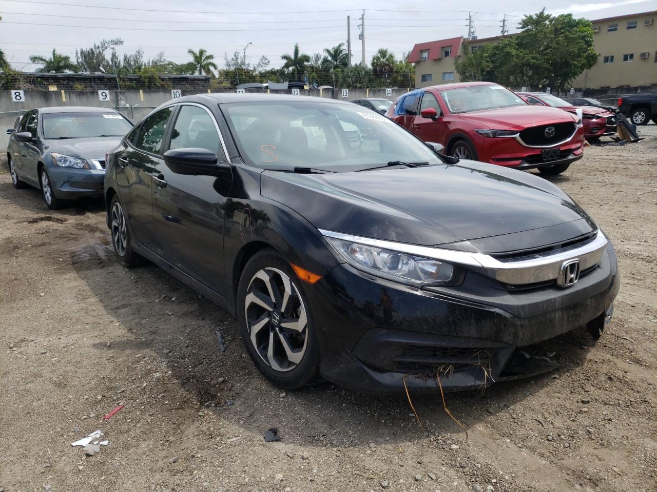 Photo 1 from auction – 2018 HONDA CIVIC LX with VIN 19XFC2F53JE021238