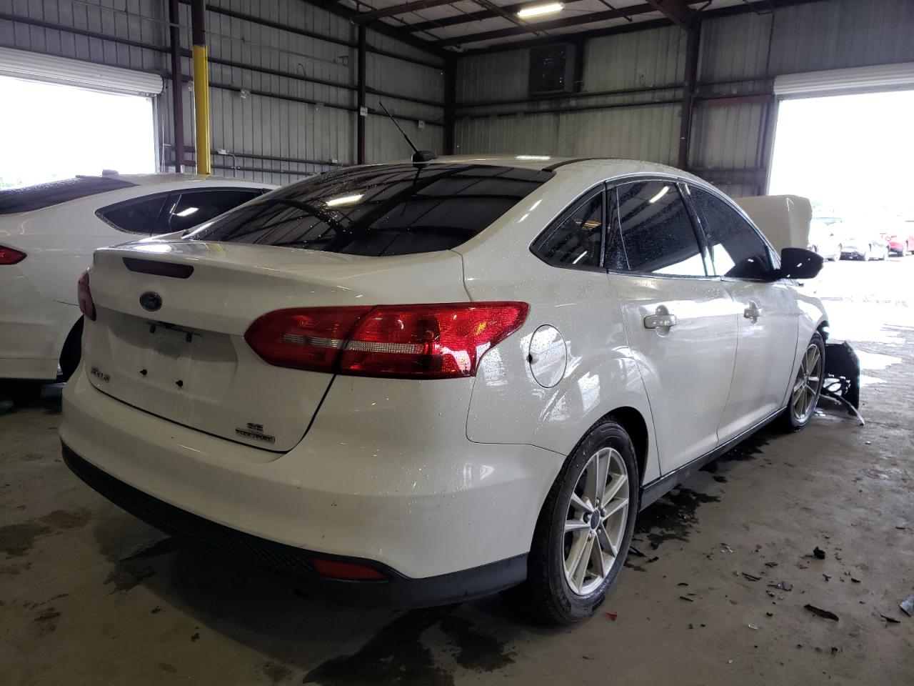 Photo 4 from auction – 2015 FORD FOCUS SE with VIN 1FADP3F29FL262670