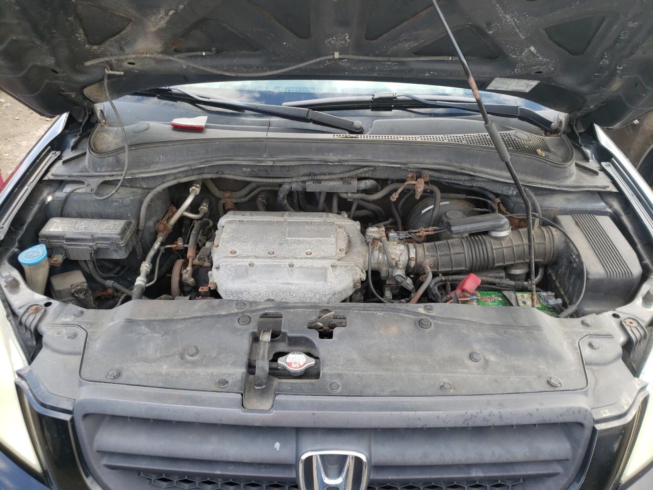 Photo 7 from auction – 2004 HONDA PILOT EXL with VIN 2HKYF18504H580043