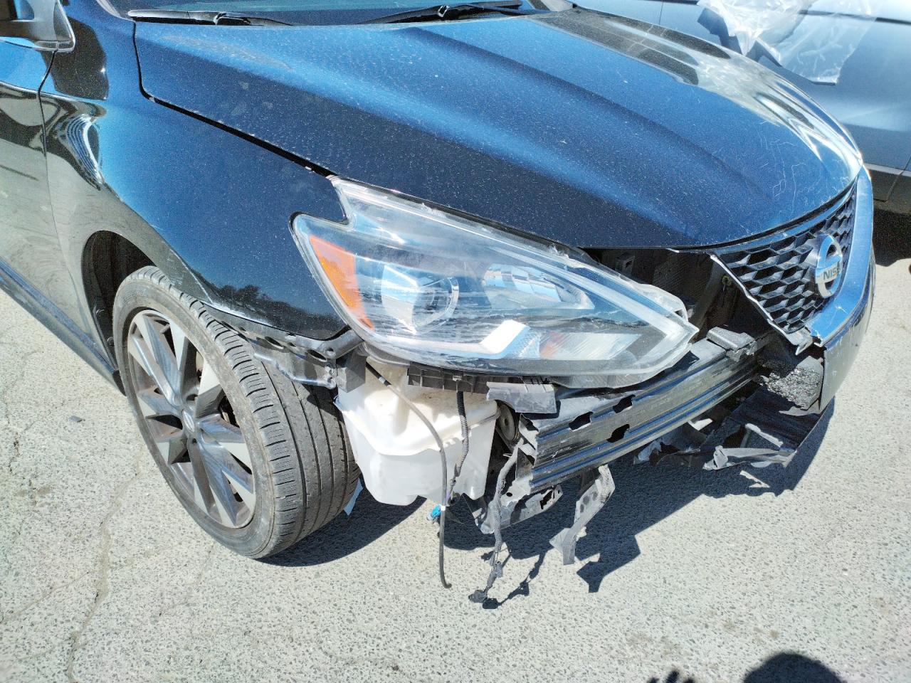 Photo 9 from auction – 2018 NISSAN SENTRA with VIN 3N1AB7AP3JY207446