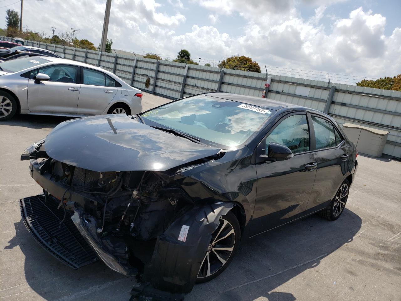 Photo 2 from auction – 2017 TOYOTA COROLLA L with VIN 5YFBURHE9HP601216