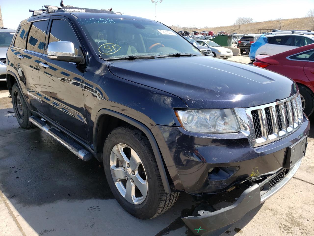 JEEP GRAND CHER 2011 with VIN 1J4RR6GT4BC607871 - Photo from auction