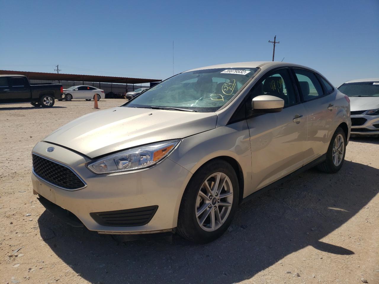 Photo 2 from auction – 2018 FORD FOCUS SE with VIN 1FADP3FE6JL292860