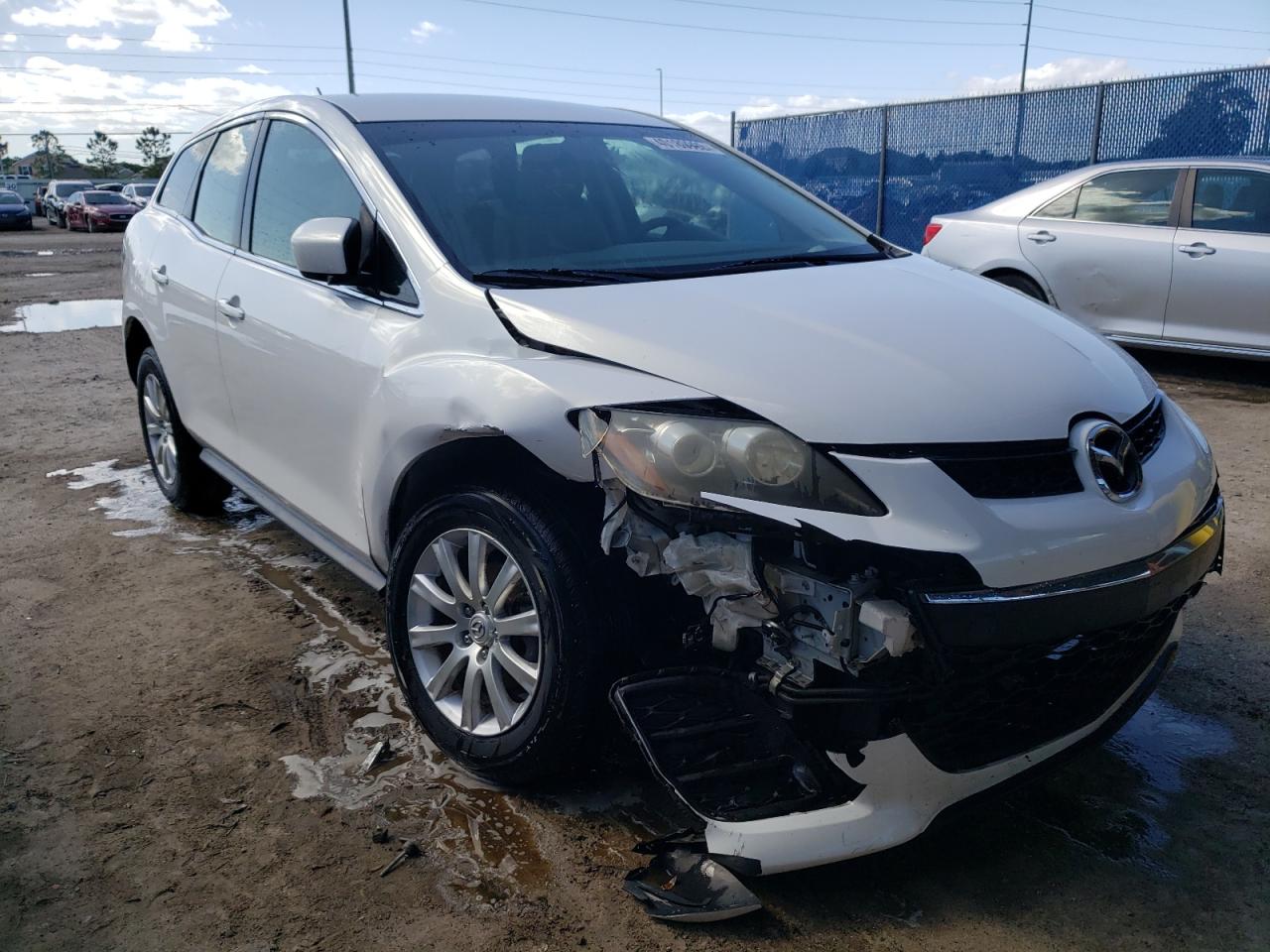MAZDA CX-7 2010 with VIN JM3ER2W5XA0339870 - Photo from auction