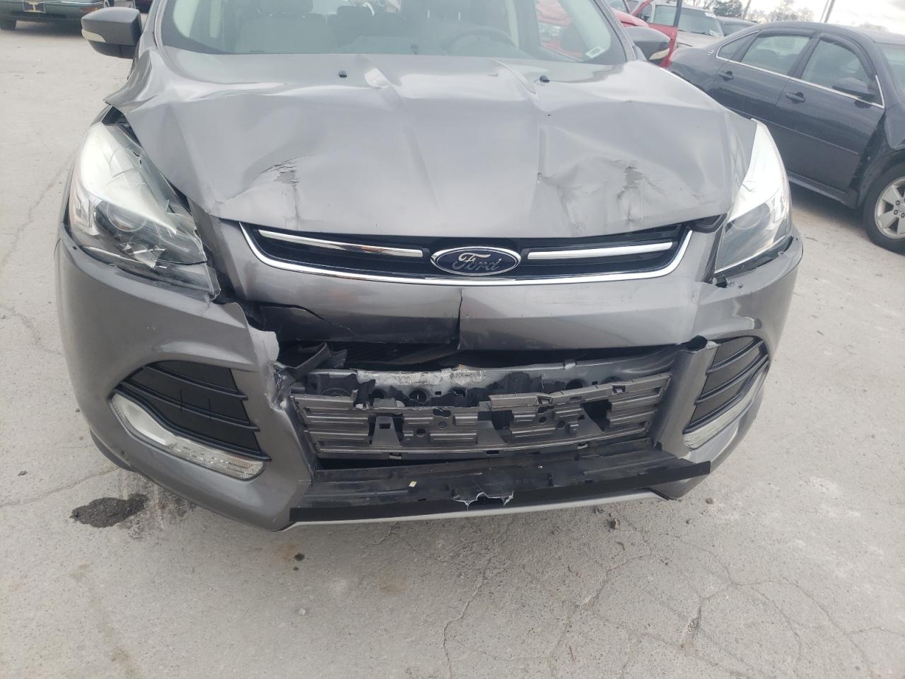 Photo 9 from auction – 2014 FORD ESCAPE TIT with VIN 1FMCU0JX0EUB96501