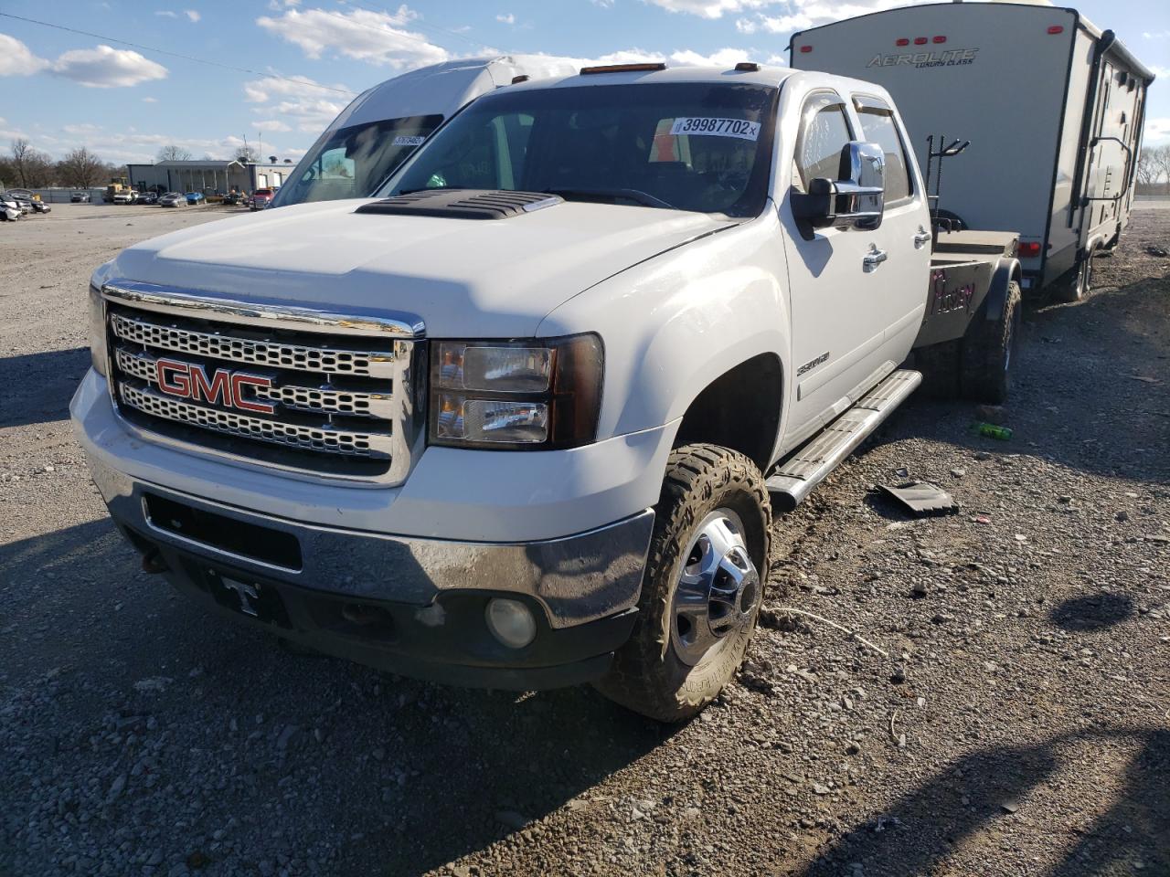 Photo 2 from auction – 2011 GMC SIERRA K35 with VIN 1GT422C85BF225944