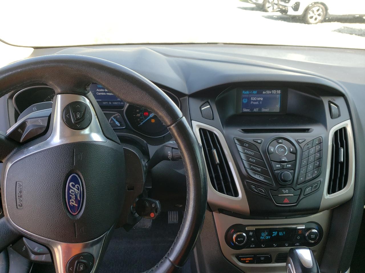 Photo 9 from auction – 2012 FORD FOCUS SEL with VIN 1FAHP3M2XCL358601