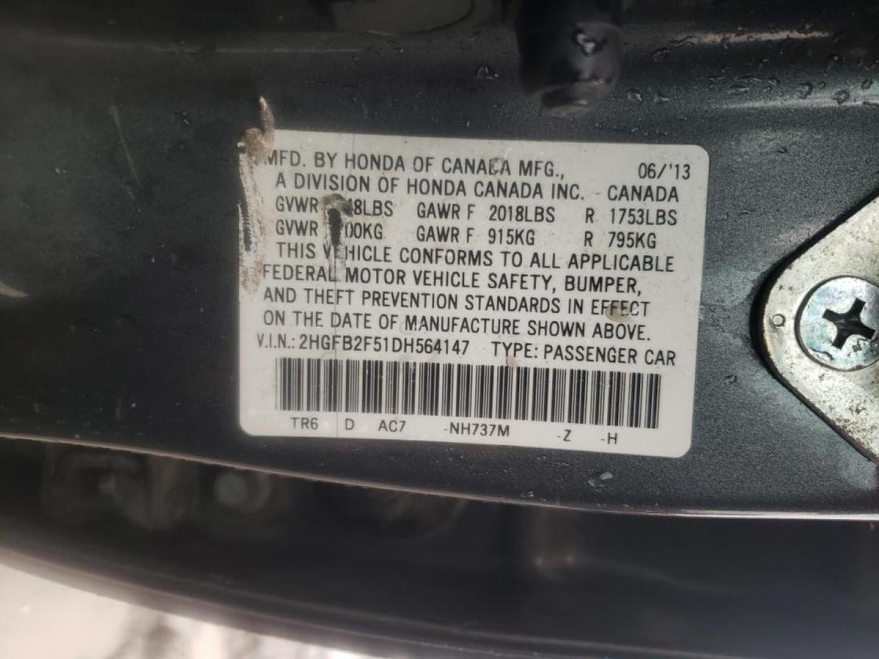 Photo 10 from auction – 2013 HONDA CIVIC LX with VIN 2HGFB2F51DH564147