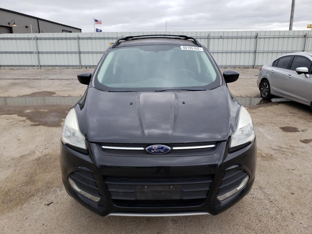 Photo 9 from auction – 2013 FORD ESCAPE SE with VIN 1FMCU0GX2DUC60561