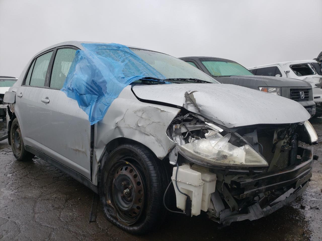 Photo 9 from auction – 2009 NISSAN VERSA S with VIN 3N1BC11E19L400037