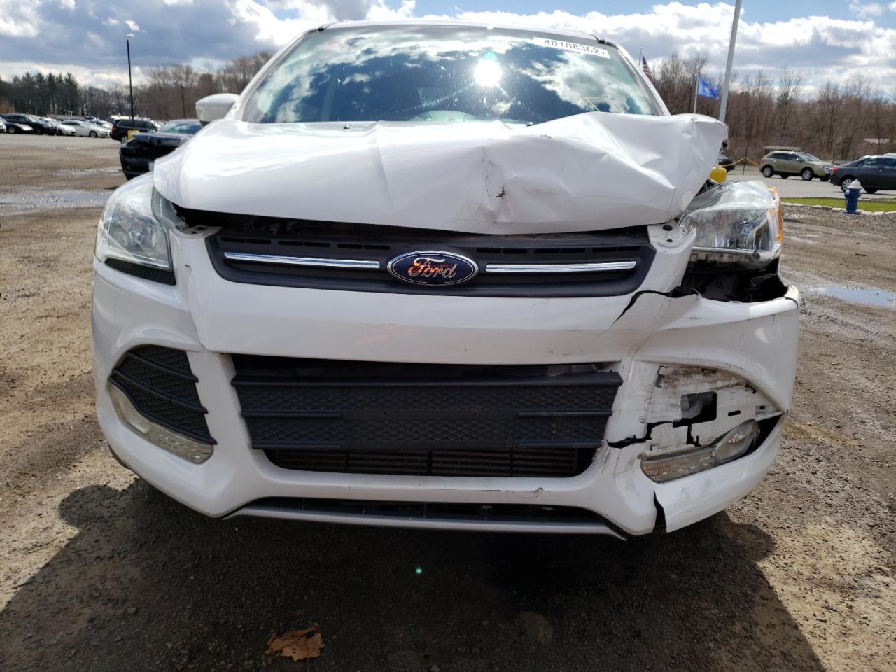 Photo 9 from auction – 2014 FORD ESCAPE SE with VIN 1FMCU9G96EUC33497