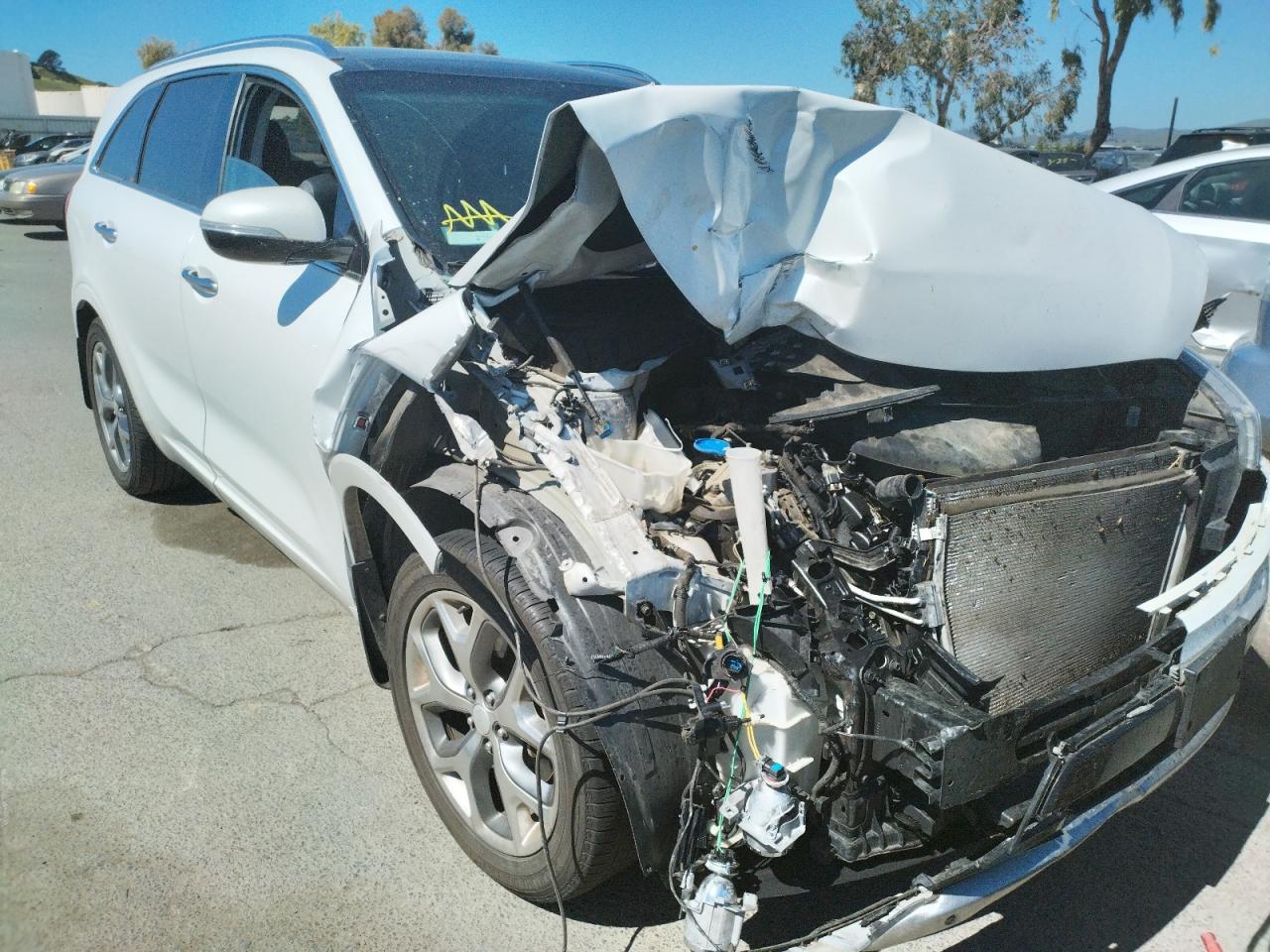 Photo 9 from auction – 2016 KIA SORENTO SX with VIN 5XYPK4A58GG072904