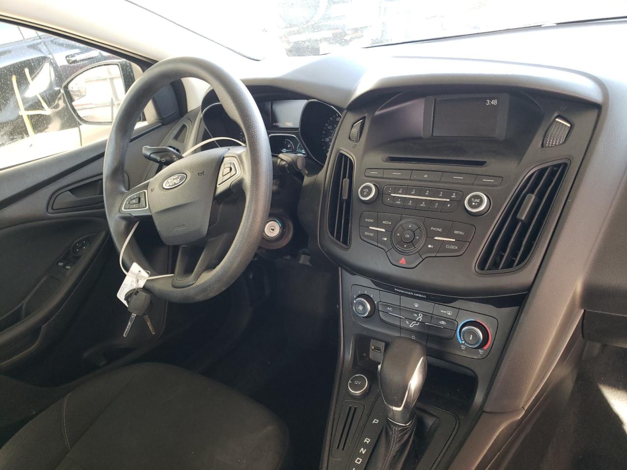 Photo 9 from auction – 2016 FORD FOCUS S with VIN 1FADP3E25GL361781