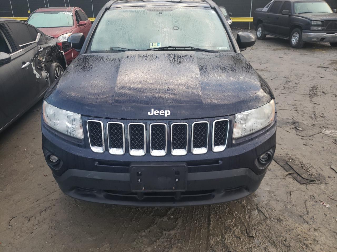 Photo 9 from auction – 2011 JEEP COMPASS SP with VIN 1J4NT1FB7BD165805
