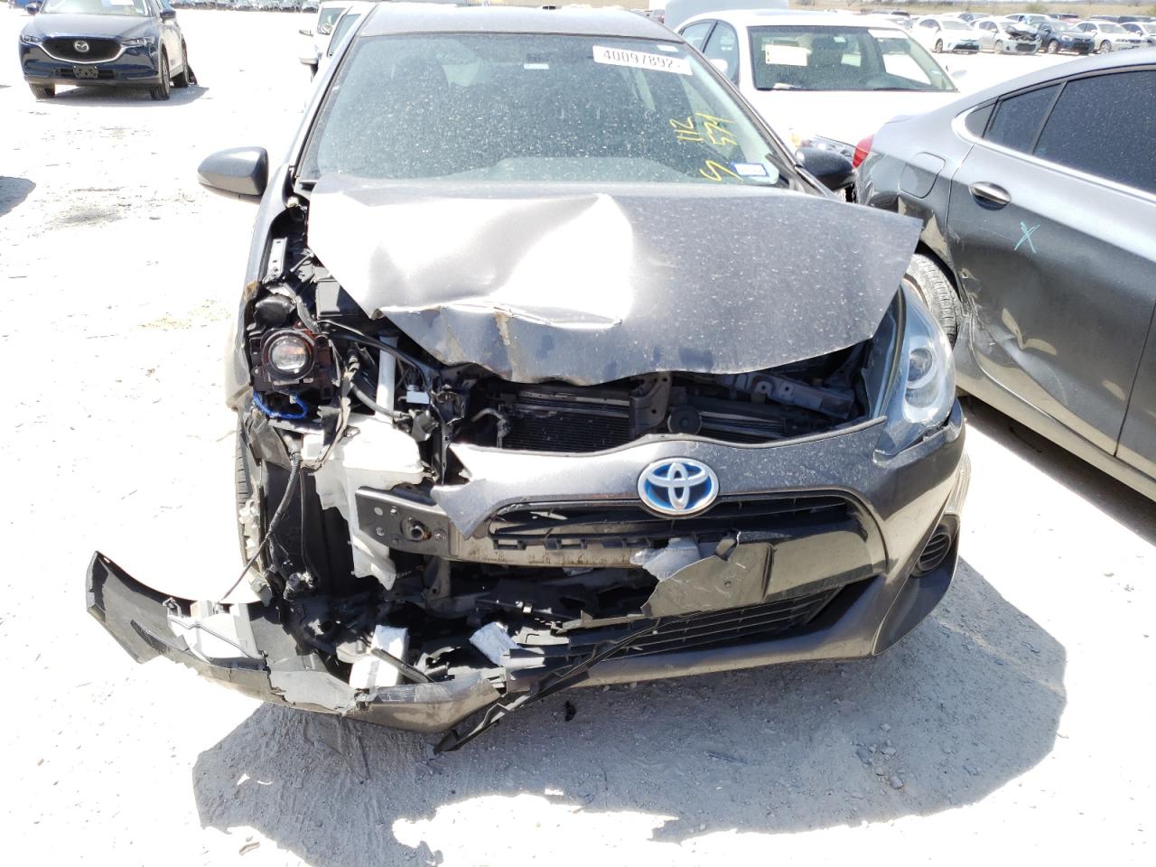 Photo 9 from auction – 2015 TOYOTA PRIUS C with VIN JTDKDTB32F1112579